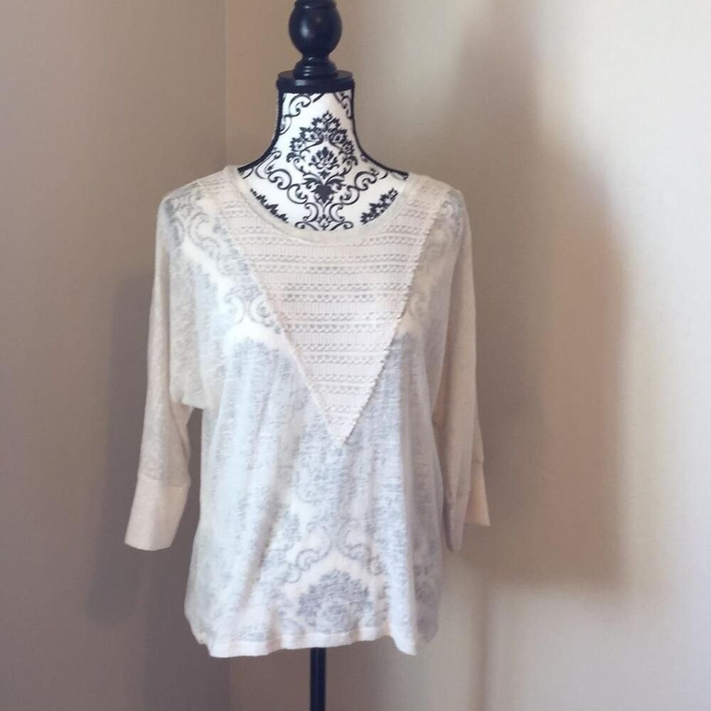 Cream sweater three-quarter length cuff sleeves